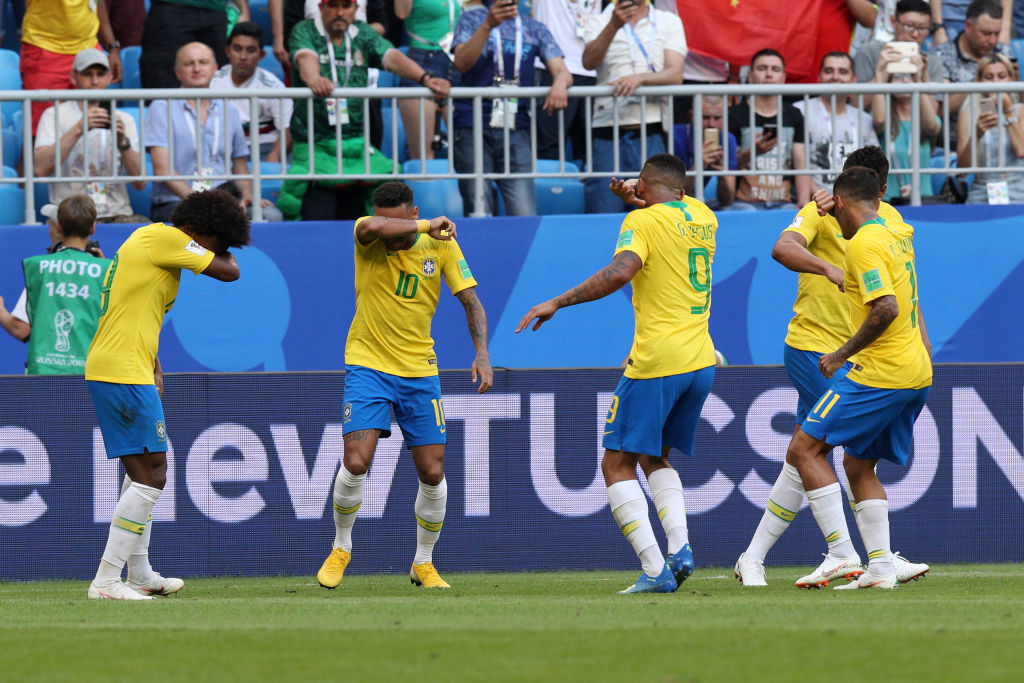 SAMARA, RUSSIA - JULY 02:  Neymar Jr of Brazil celebrates with teammates after scoring his team's first goal during the 2018 FIFA World Cup Russia Round of 16 match between Brazil and Mexico at Samara Arena on July 2, 2018 in Samara, Russia.  (Photo by Buda Mendes/Getty Images)